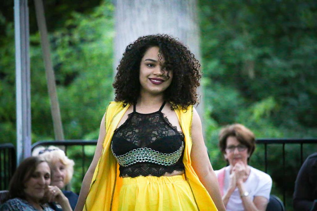 Naturally dyed yellow cotton kimono-style vest and dress with upcycled pull-tab belt at Style & Sustainability; a student-led sustainable fashion design