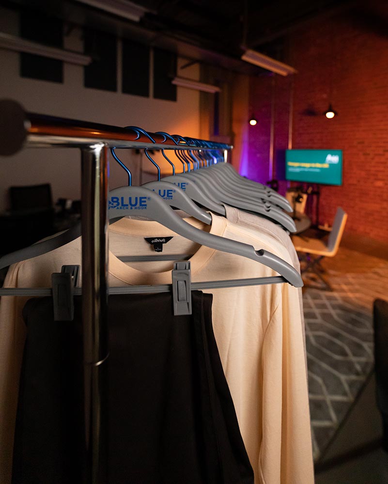 Arch and Hook BLUE Hangers on rack at CIEL Studio